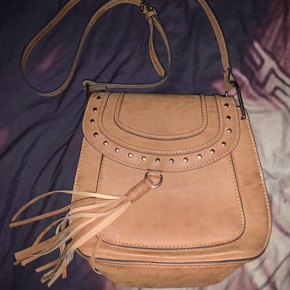 Satchle bag style purse l, used a few times, clean and very spacey too.